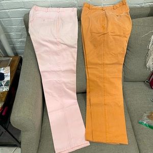 Two pairs of Peter millar pants. One pink pair and one orange